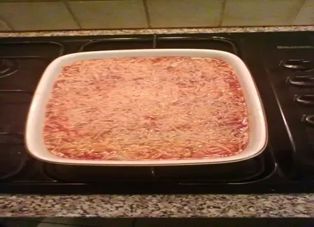 Gratin de lieu noir à la sauce tomate