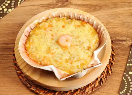 Cassolettes de crevettes gratinées