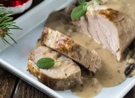 Rôti de porc aux champignons frais sauce moutarde