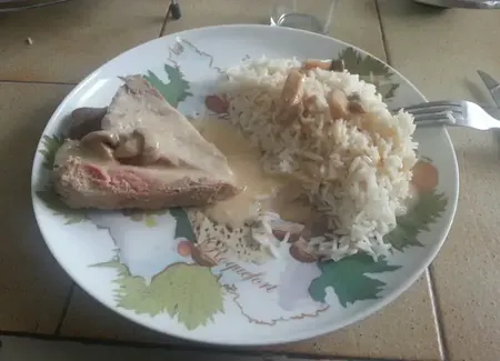 Noix de veau à la crème et aux champignons