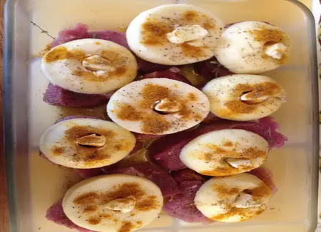 Filet mignon aux pommes et curry au four