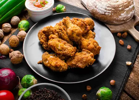 Ailerons de poulet marinés et pannés