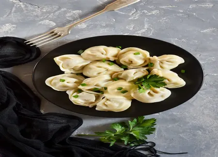 Raviolis maison au saumon et champignons