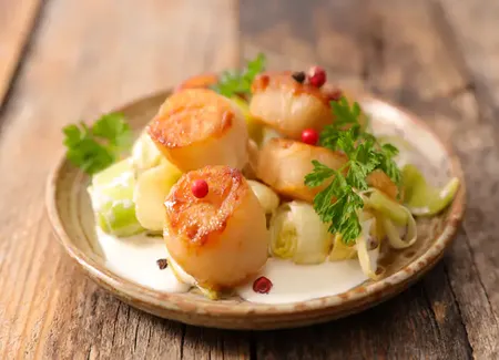 Noix de saint-jacques flambées au cognac